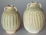 Sisatchanalai celadon jars, height 13 and 15cm