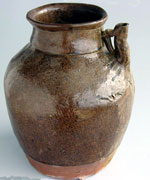 brown-glazed spouted jar