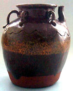 ring-handled spouted jar