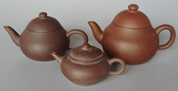Yixing teapots, heights 9.5, 6.5 and 11cm