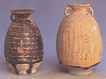 Photo of brown-glazed ring-handled bottles.