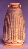 Photo of bottle with vertical striations.